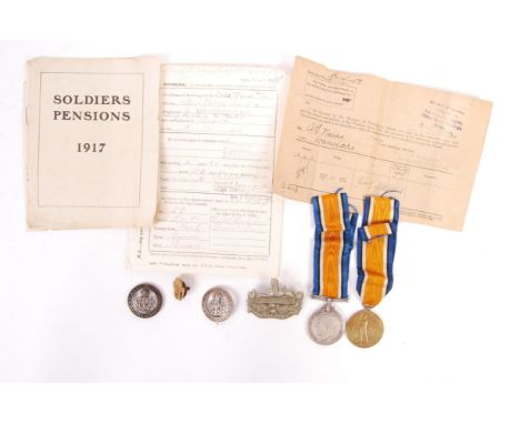 A WWI First World War medal pair awarded to a 242678 Private A. G. Needs of the Royal Warwickshire Regiment. Comprising War M