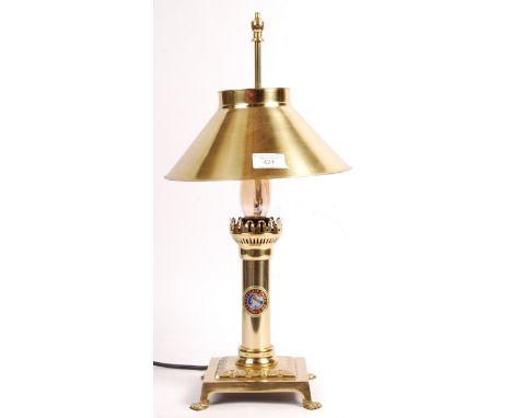 A 20th century reproduction White Star Line pattern ' SS Titanic 1912 - 1st Class Only ' brass table lamp. Squared base stand