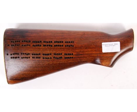 A vintage / antique trench art style rifle butt with brass end caps, made in to cribbage board. Likely from a military rifle.