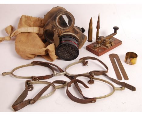 A collection of assorted First World War and Second World War militaria. Comprising: WWII normal sized gas mask stamped Oct 1