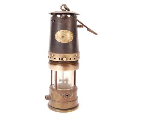 A vintage Patterson Lamps Ltd 37 Type GTL9 Gateshead-On-Tyne mining carbine lamp comprising of a steel, brass and glass with 
