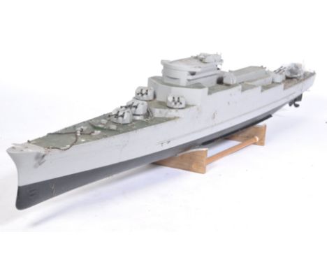 A 20th century large scale scratch built model of a WWII Second World War Battleship / boat. Painted details with various gun