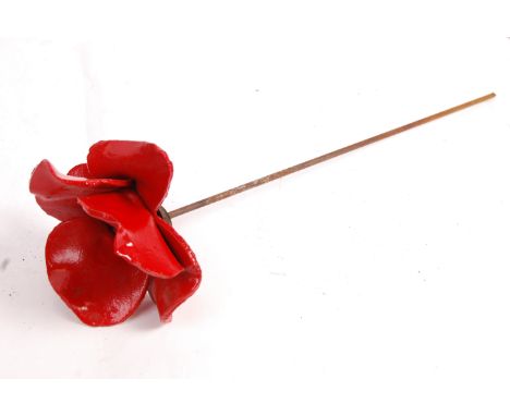 Paul Cummins and Tom Piper - An original ceramic poppy from the art installation 'Blood Swept Lands And Seas Of Red' shown at