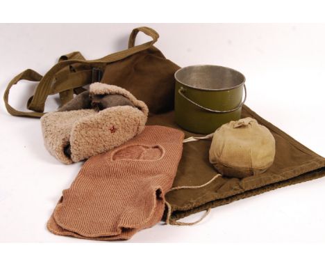 A collection of assorted post WWII Second World War Soviet Russian Red Army USSR related uniform accessories to include; wint