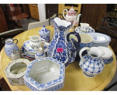A mixed lot of ceramics to include vases, the largest 12" h, plates, planters, Portmerion jugs and a teapot 