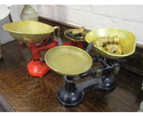 Two vintage red and black painted weighing scales 