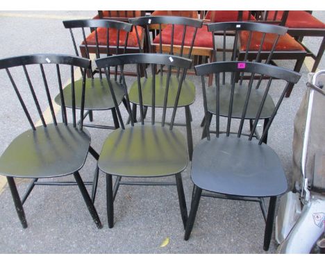 A set of six mid 20th century Danish ebonized stick back chairs 