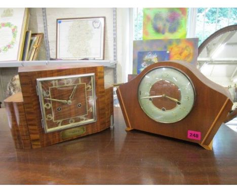 A mid 20th century Smiths walnut cased mantel clock with Westminster chimes, and an Art Deco style walnut cased mantel clock 