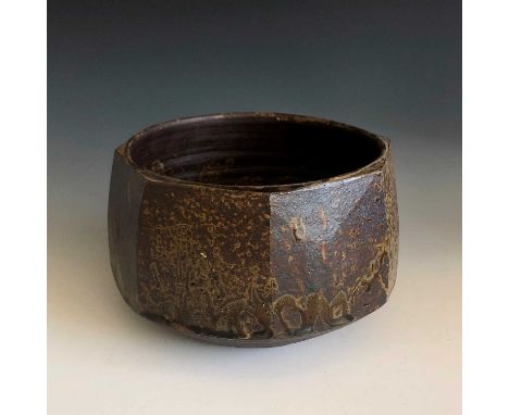 A Janet Leach stoneware studio pottery bowl with cut sides and ash glaze, maximum diameter 18cm, height 11.8cm, impressed mak