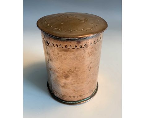 An Arts and Crafts period copper tea caddy of cylindrical form, the lid embossed with text 'Tea', unmarked. Height 12cm.