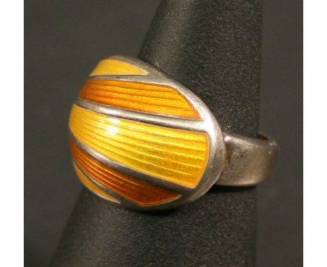 A DAVID ANDERSON 925S AND ENAMEL RING of stylised form, enamelled with bands of orange, marked 'David-Anderson Norway 925s' r