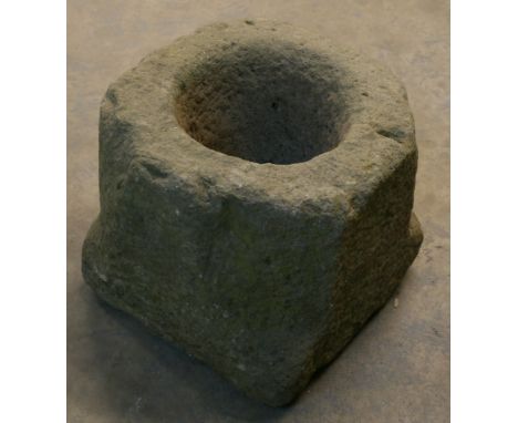 A SANDSTONE TROUGH of rounded square form with central well. 39cm(h) x 44cm(d) CONDITION: Weathering but generally ok