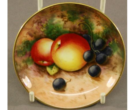 A ROYAL WORCESTER HAND-PAINTED PIN DISH of circular form, decorated with fruit against a mossy setting, signed Roberts, date 