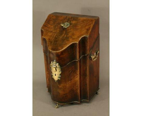 A GEORGE III MAHOGANY KNIFE BOX of typical sloping and shaped form with herring bone edge detail, brass handle, lock plate an