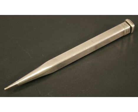 A MID 20TH CENTURY STERLING SILVER 'YARD-O-LEAD' PROPELLING PENCIL with bands of engine turning and adjustable sliding cap, m