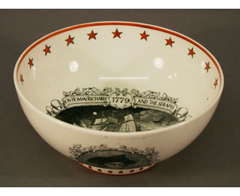 A COMMEMORATIVE BOWL transfer printed with 'Bon Homme Richard and the Serapis 1779' to the interior and 'Commodore John Paul 