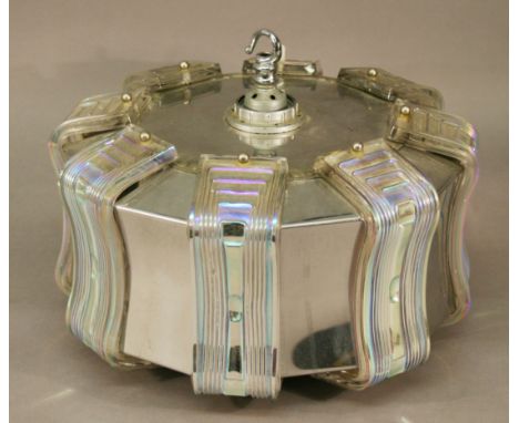 A 1950'S CHROME AND IRIDIZED GLASS LIGHT FITTING of circular form with concaved edge, mounted with eight geometrically moulde