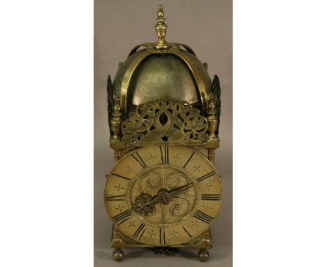 A VICTORIAN BRASS LANTERN CLOCK being a copy of an earlier design, the chapter ring having Roman hours and bearing the name '