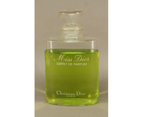 A LARGE CHRISTIAN DIOR 'MISS DIOR ESPIRIT DE PARFUM' GLASS FACTICE PERFUME BOTTLE. 33cm(h) CONDITION: Accumulated dirt and ol