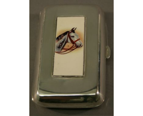 A 925 GRADE WHITE METAL AND ENAMEL CIGARETTE CASE of hinged oblong form, the cover with slender enamelled panel of a horses h