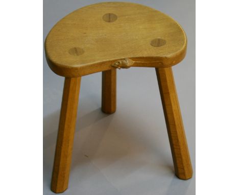 Workshop of Robert Thompson of Kilburn, North Yorkshire A "MOUSEMAN" OAK STOOL of slightly dished shaped form with carved mou