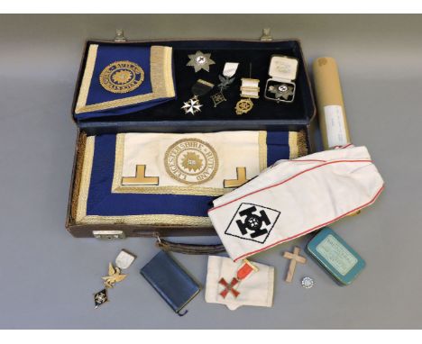 A Masonic case, with regalia for Leicestershire/Rutland, including sash, scroll, apron, three silver and three other medals