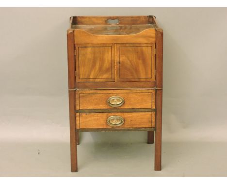 A mahogany bedside cabinet, converted from a commode