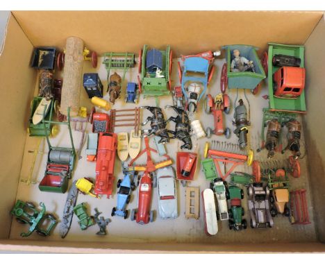 Britains and other die cast toy farm carts, Dinky 75 lawn mower tractor, wheelbarrow, Models of Yesteryear, etc