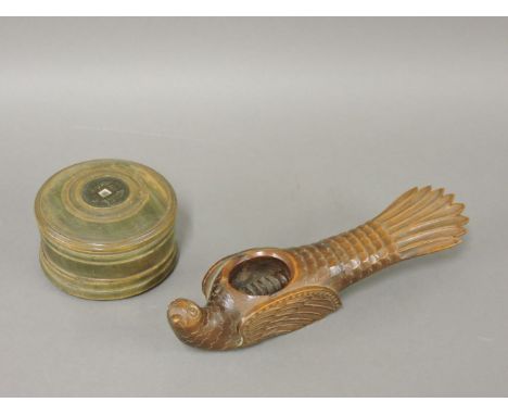 A late 18th century horn pot and cover, ring turned decoration and each section inset with Qianlong cash, 7.5cm diameter, and