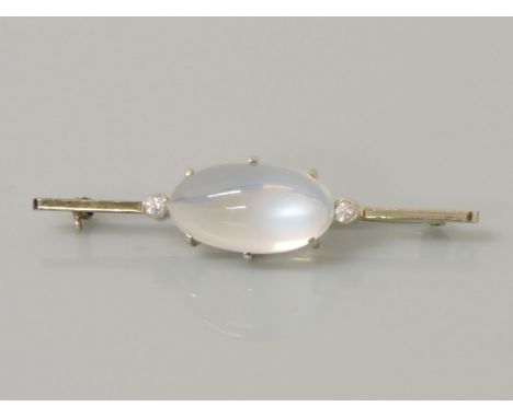 A white gold Art Deco moonstone and quartz bar brooch, marked 9ct, 4.69g