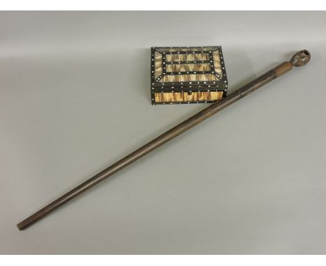 A hardwood walking stick, carved with a skull, 94cm high, and a porcupine quill box