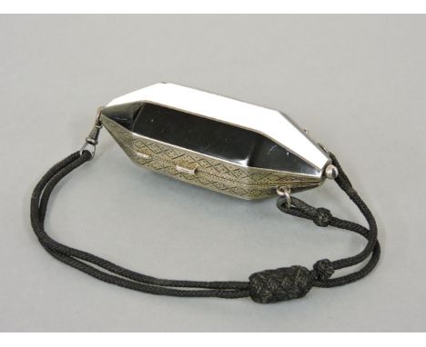 A Continental sterling silver Art Deco minaudière, of elongated hexagonal form, tapering silver bands with the clasp and hing