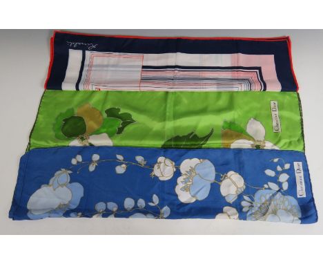 A Christian Dior silk scarf, white ground with green printed design, a further Christian Dior silk scarf, and a Rinaldi scarf