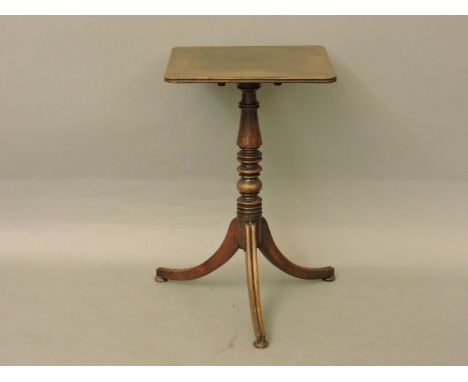 A Regency mahogany lamp table, the square top with a reeded edge over a turned column on a tripod base, 73.5cm high, 45.5cm s