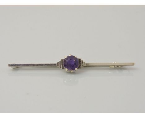 A white gold Art Deco single stone amethyst bar brooch, marked 9ct, 3.32g