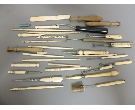 A collection of bone, ivory, and turned wooden sewing and crochet tools