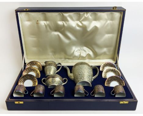 A ROSENTHAL AND WHITE METAL OVERLAID SIX PLACE COFFEE SET, retailed by Garrards, comp. coffee pot, milk jug, sugar bowl six c