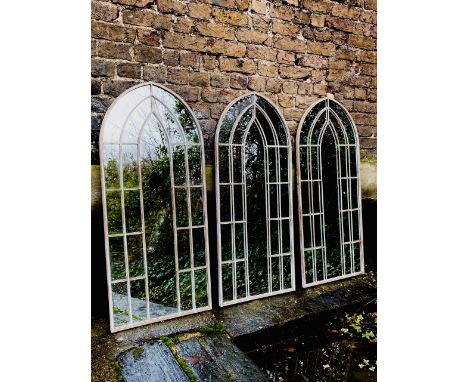 ARCHITECTURAL GARDEN WALL MIRRORS, 115cm high, 50cm wide, a set of three, Gothic style, grey metal frames, overlaid glazing b