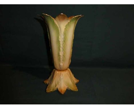 A Royal Worcester blush ivory Vase, relief moulded in a pattern of leaves, 20cm high 