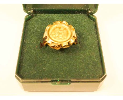 A 15ct gold signet ring set with gold 2 pesos Mexican gold coin 1945, size K 1/2, 4.2g