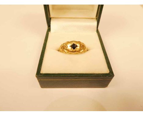 A 9ct gold sapphire star ring with incise decoration and chip diamond shoulder mounts size K 1/2 , 2.8g