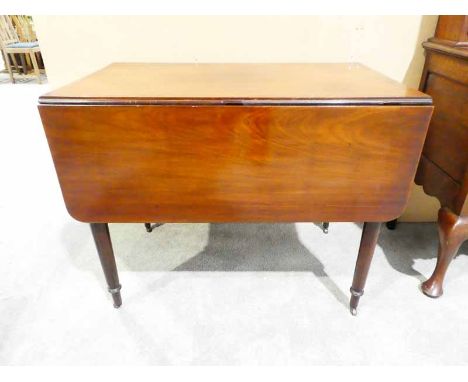 A 19th century mahongany Pembroke Table of typical style, single drawer to one end, false drawer to the other, supported on r