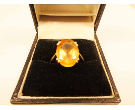 A 9ct gold oval cut dress ring, the stone 13mm X 10mm, size O 1/2, 3.3g