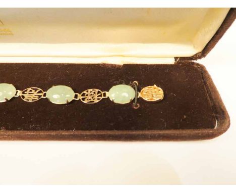 A 14k gold pale green jade panel bracelet, the panels bearing imperial characters 18cm, 9.3g
