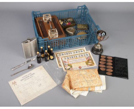 A box of collectables. Includes silver trophy, silver spoon, desk tidy, India/Burma silk map, brass lighter, etc.  