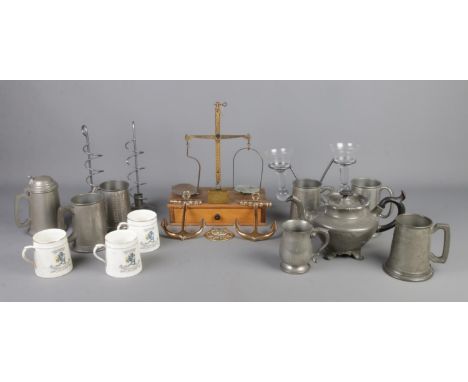 A box of assorted items, to contain a collection of pewter, including tankards, C.W.S 1919 peace commemorative mugs, Webb bal
