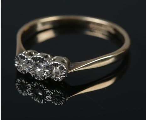 A 9ct gold & platinum ring and three stone diamond ring with illusion set border.Ring size RÂ½Weight 1.8g  