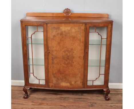 Walnut display cabinet with ball and claw feet.Hx127cmWx120cmDx37cm  crack to glass panel front left bottom corner