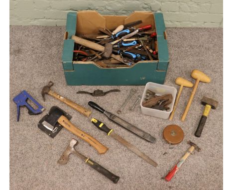 A box of tools. Includes Rabone tape measure, axe, Stanley examples, wood planes, etc.  