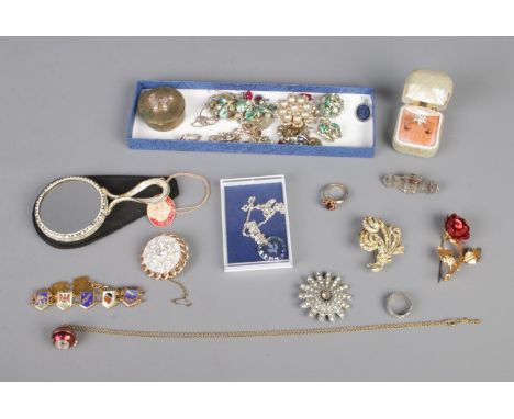 A collection of mostly costume jewellery to include silver ring, enamel bracelet, Royce watch necklace, silver brooch, etc.  